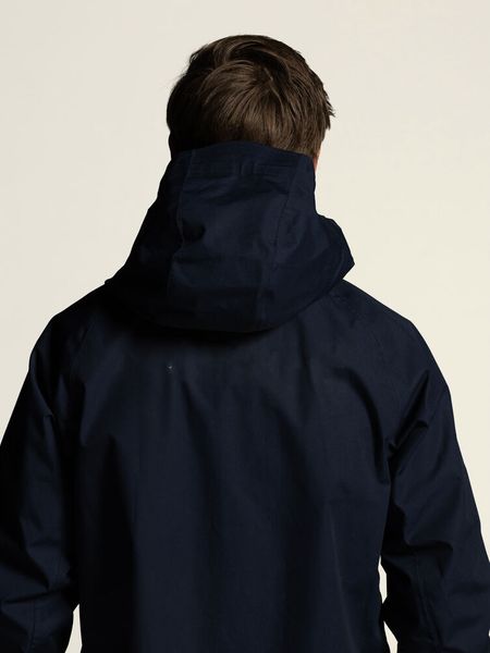 Hovedbilde OL 2l frakk i marine til herre fra Crafts OL 2026 kolleksjon